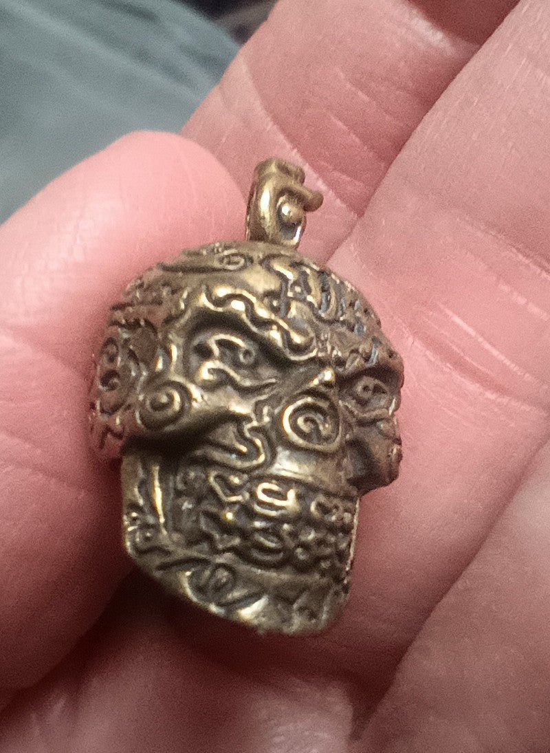 Brass metal skull pendant Thailand