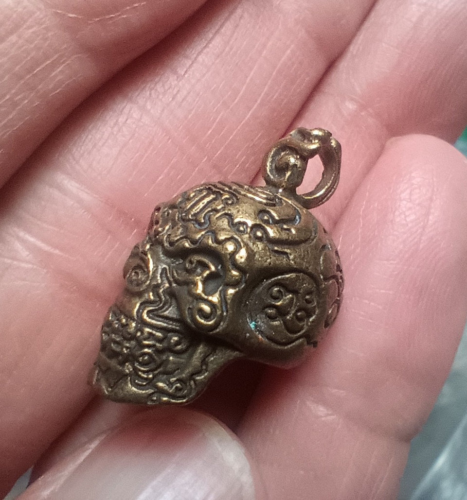 Brass metal skull pendant Thailand