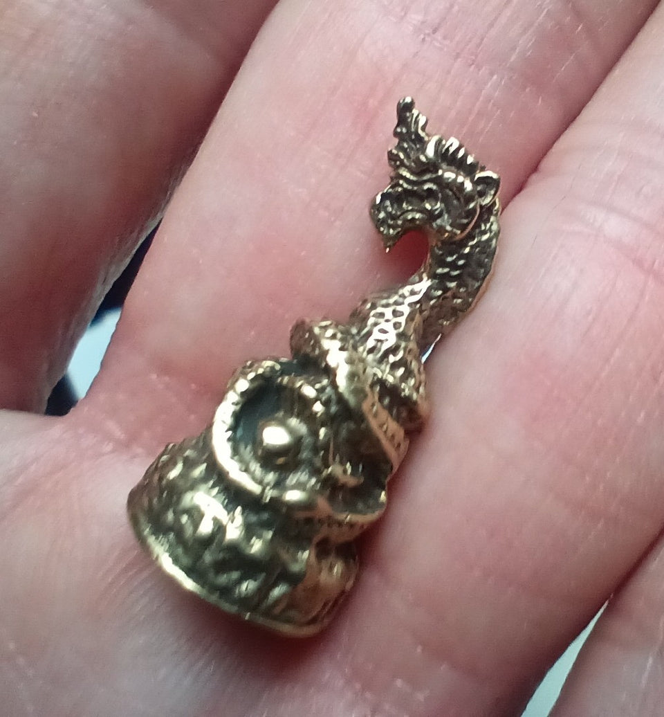 Small dragon stupa statue Buddhist Thailand