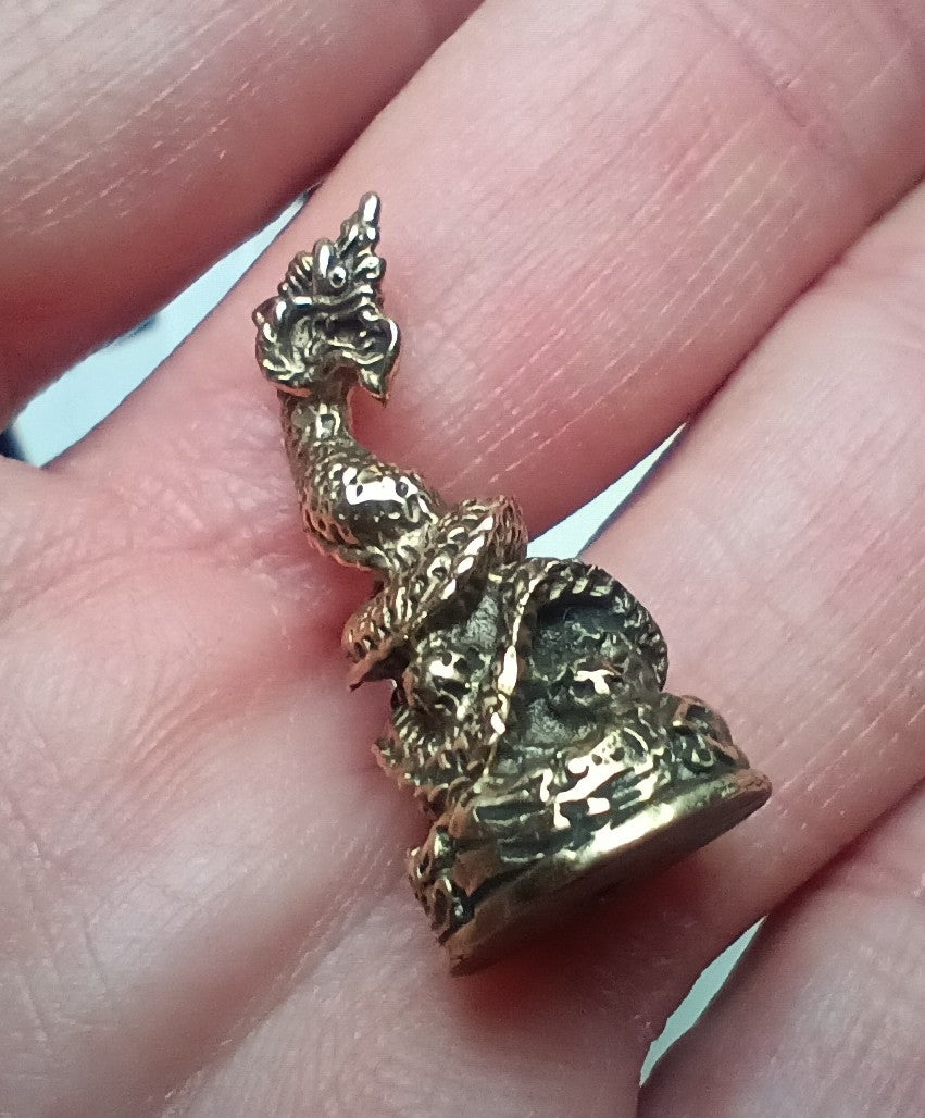 Small dragon stupa statue Buddhist Thailand